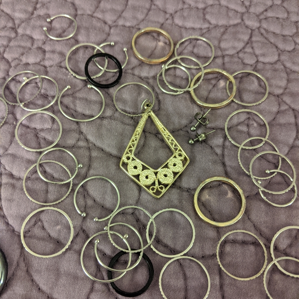 Pendant, various rings, micro studs